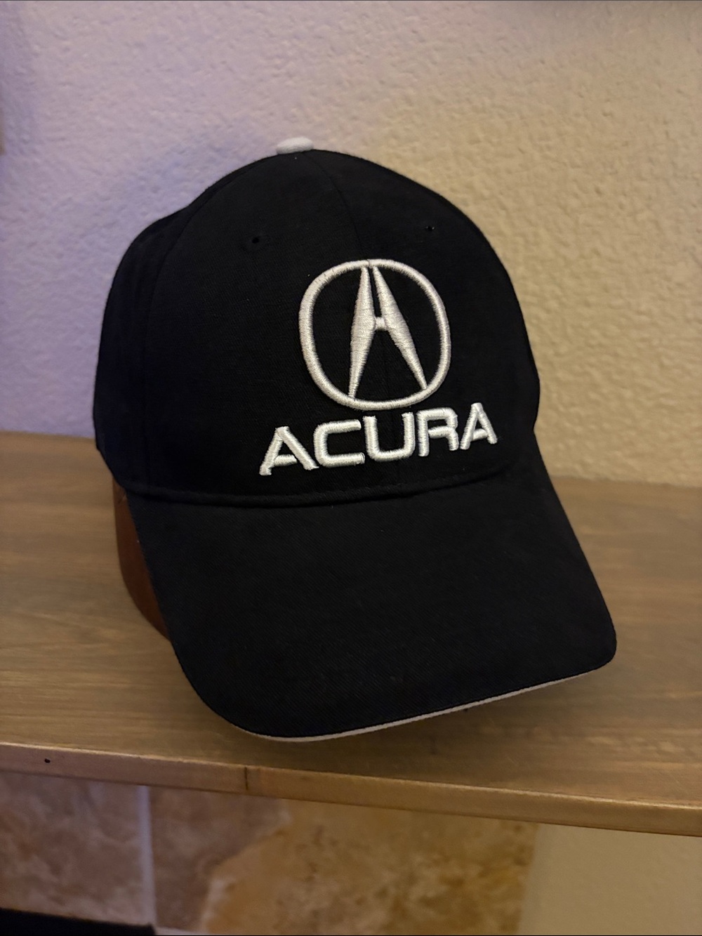 Adjustable Black Baseball Cap with White “ACURA” Logo. New no tags.